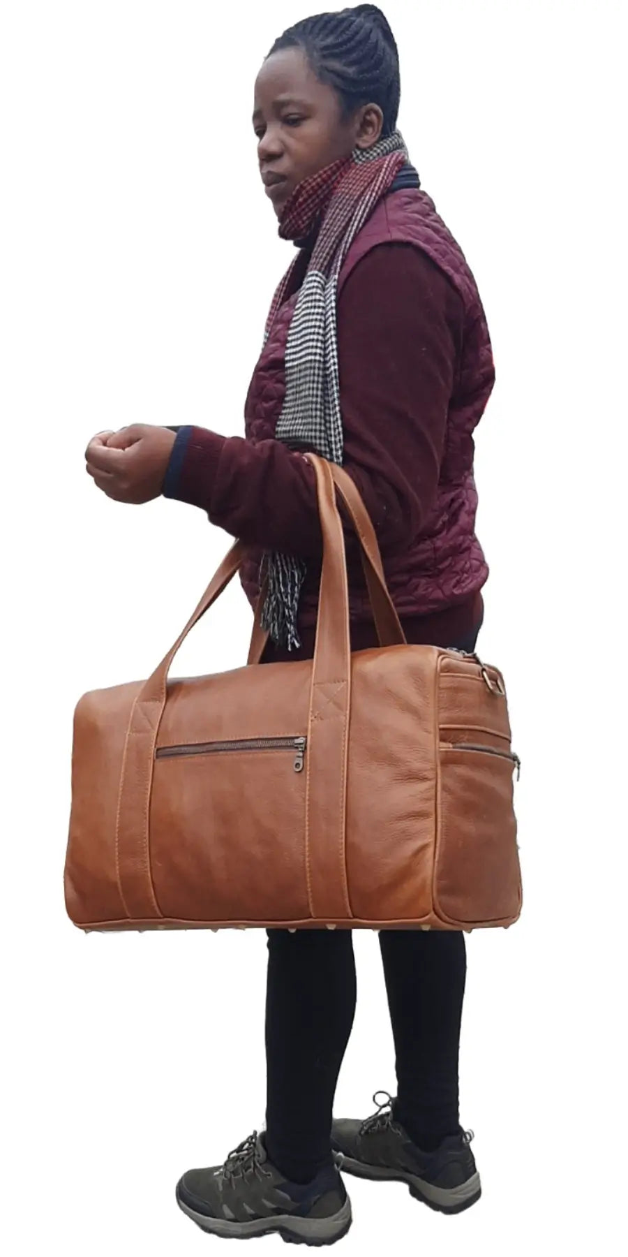 A lady carrying beautiful pecan tan Anny Marie travel bag from Cape Masai Leather