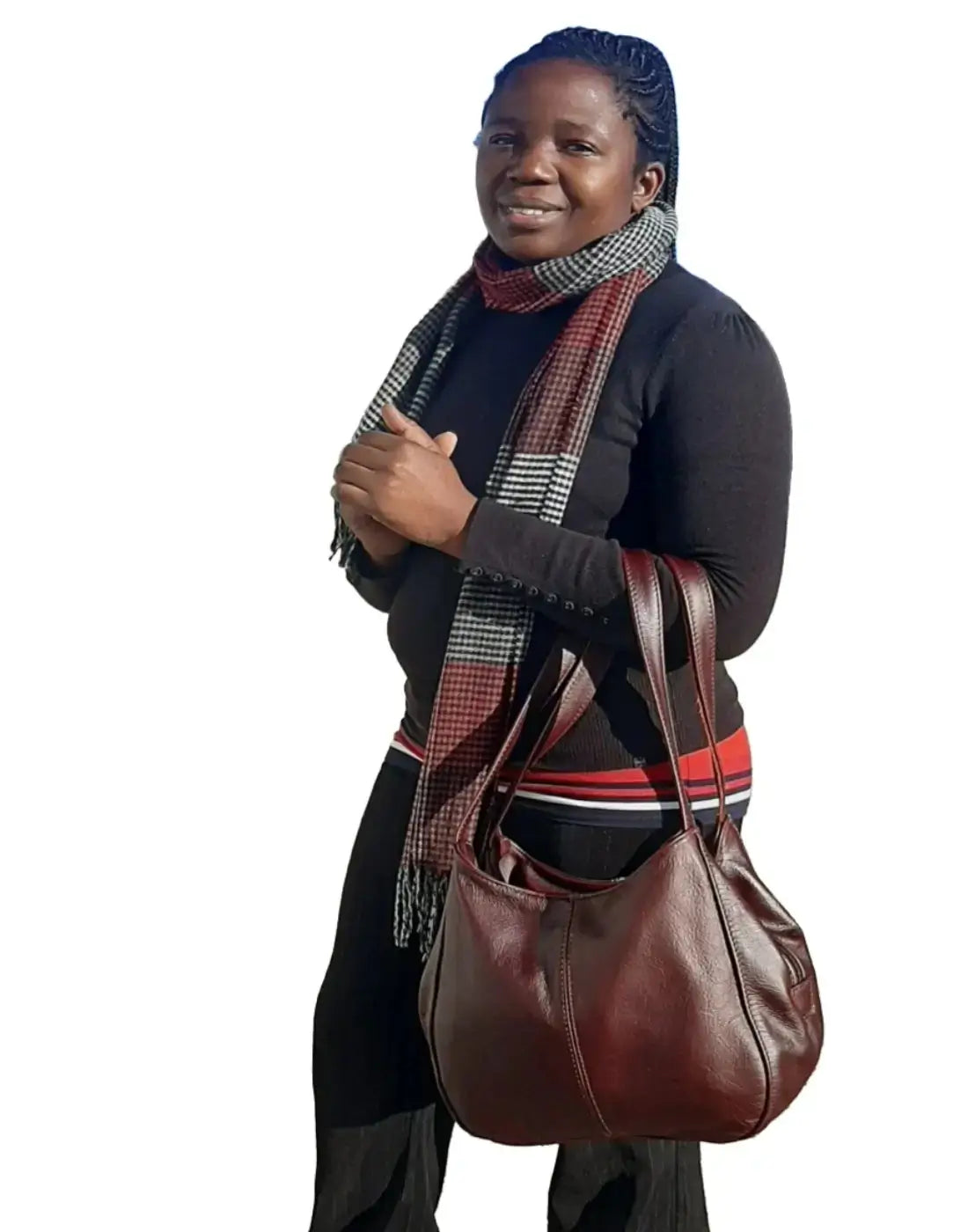 A lady carrying beautiful cherry red/dark red corra leather bag from Cape Masai Leather.