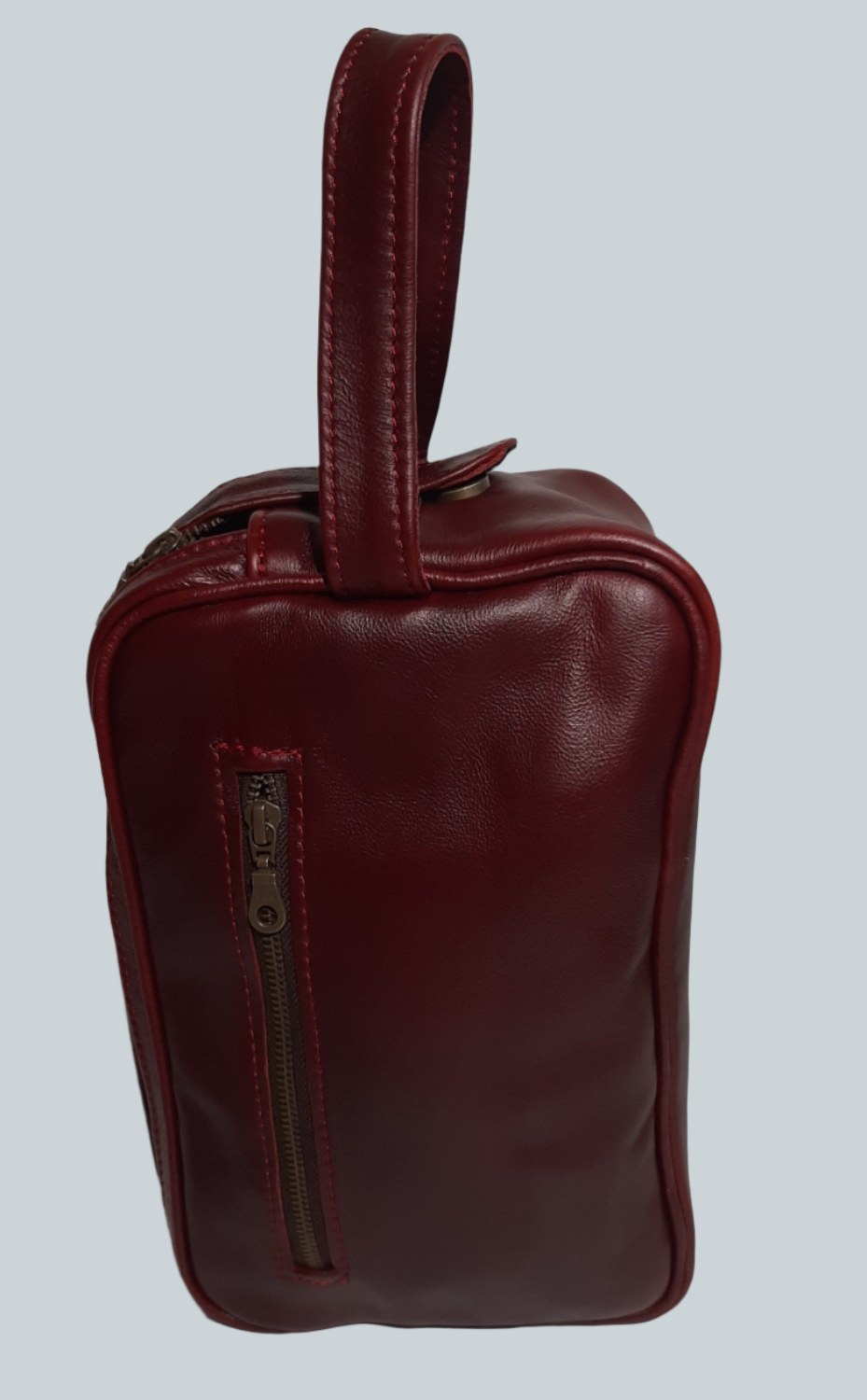 J boy toiletry bag in cherry red by Cape Masai leather
