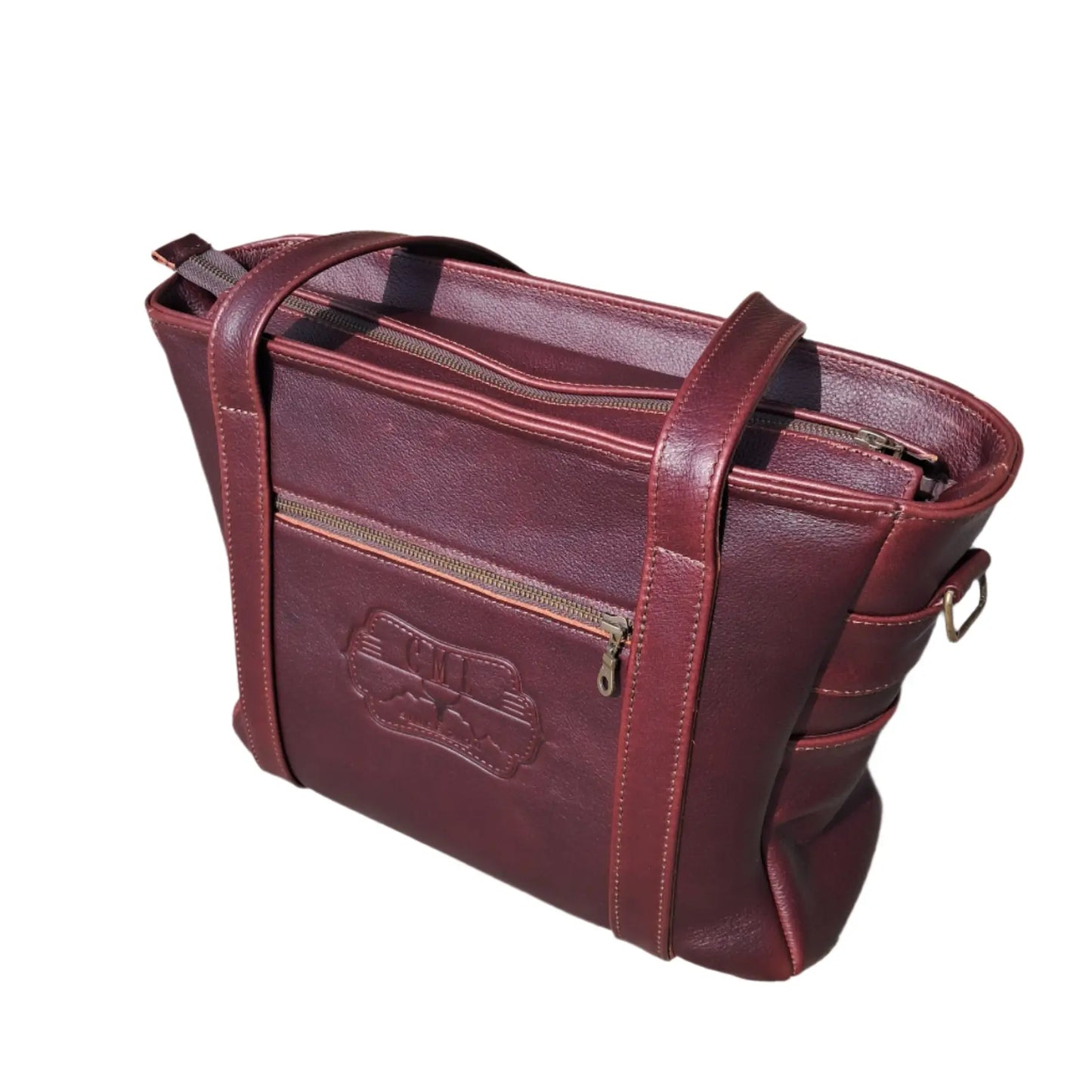 Ladies Laptop bags in dark tan colour made in Cape Town by Cape Masai leather with visible brand logo on a white background