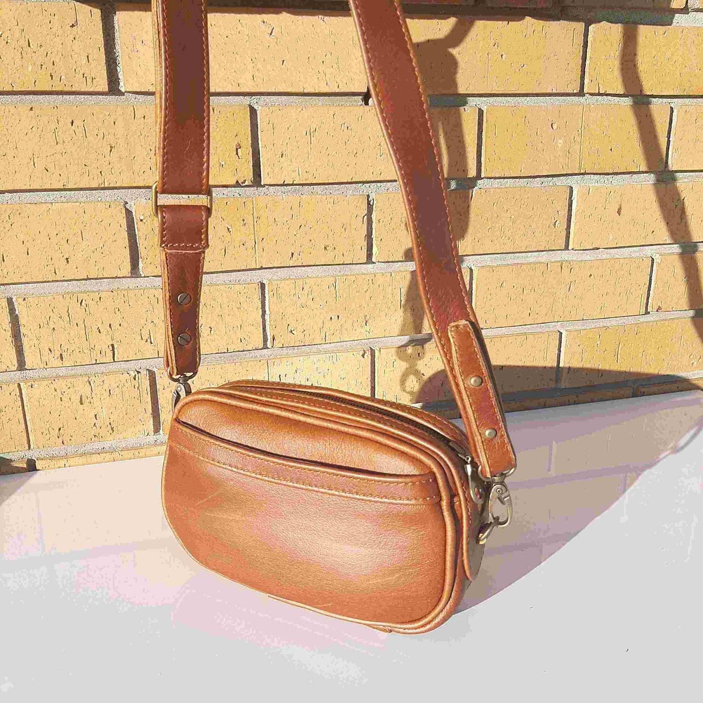Hanging Lady X Leather Sling in cape rust