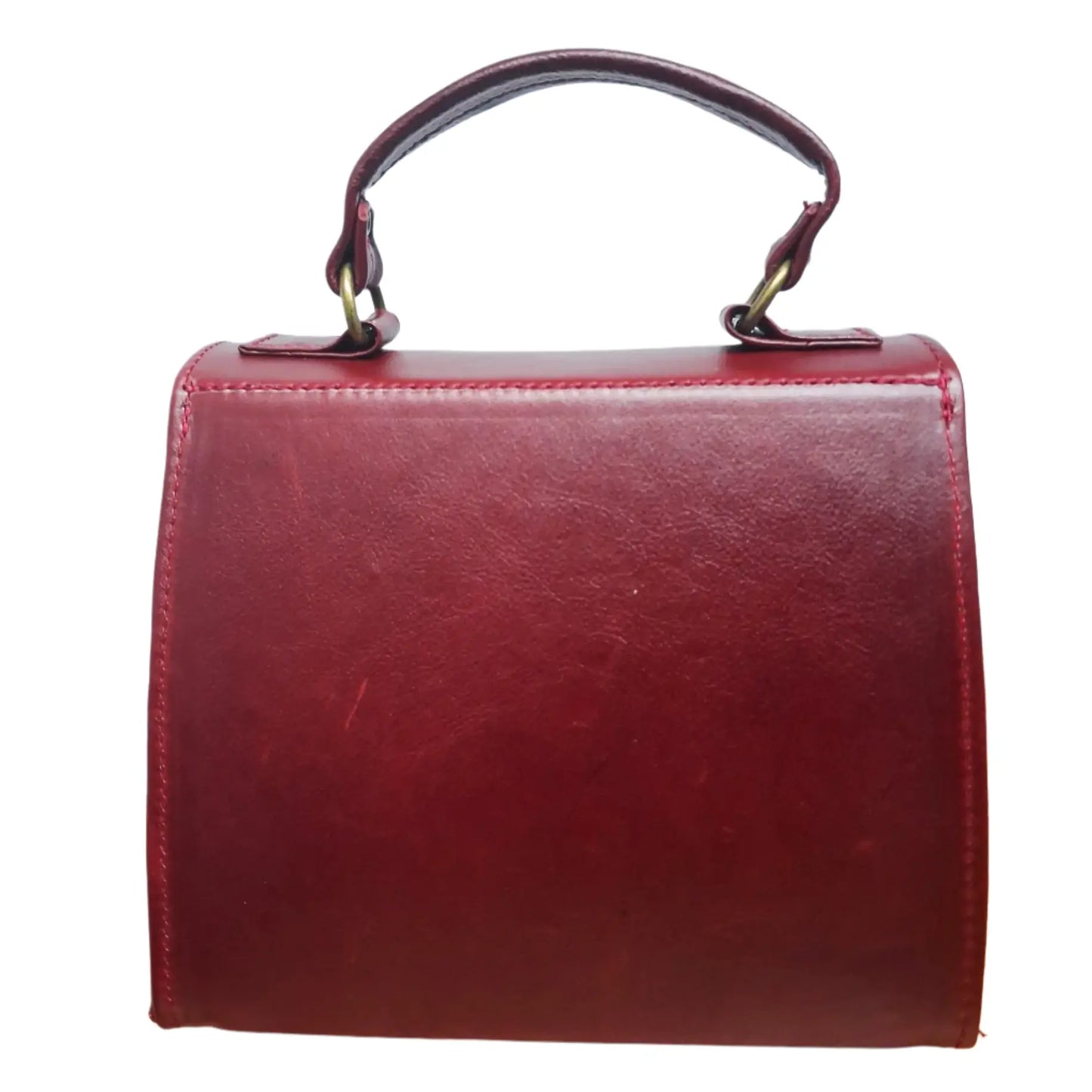Red Lawrene designer handbag with a handle on a white background