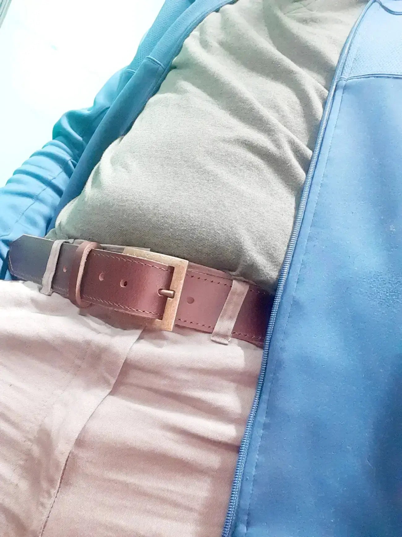 A man wearing Cape Masai genuine leather belt