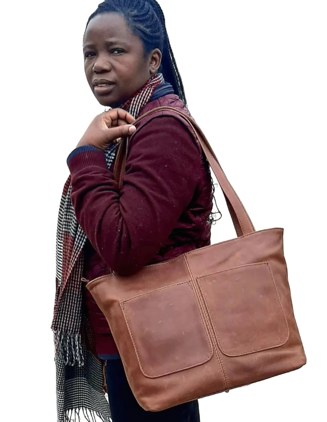 A beatiful lady carrying a beautiful Crossbody "Botha bag in pitstop ciger " outside Cape Masai Leather in Cape Town