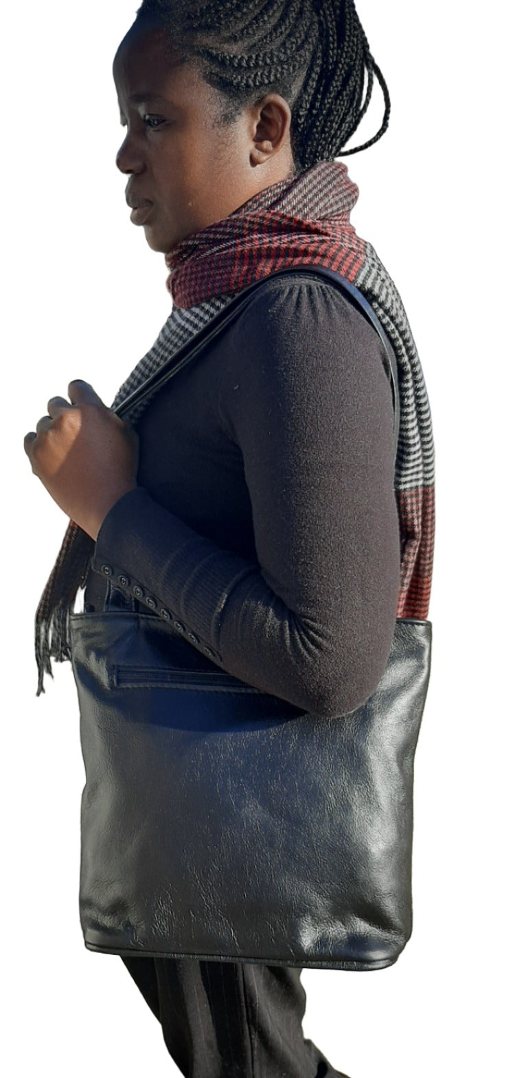 A lady carrying beautiful black Cm small leather bags from Cape Masai Leather