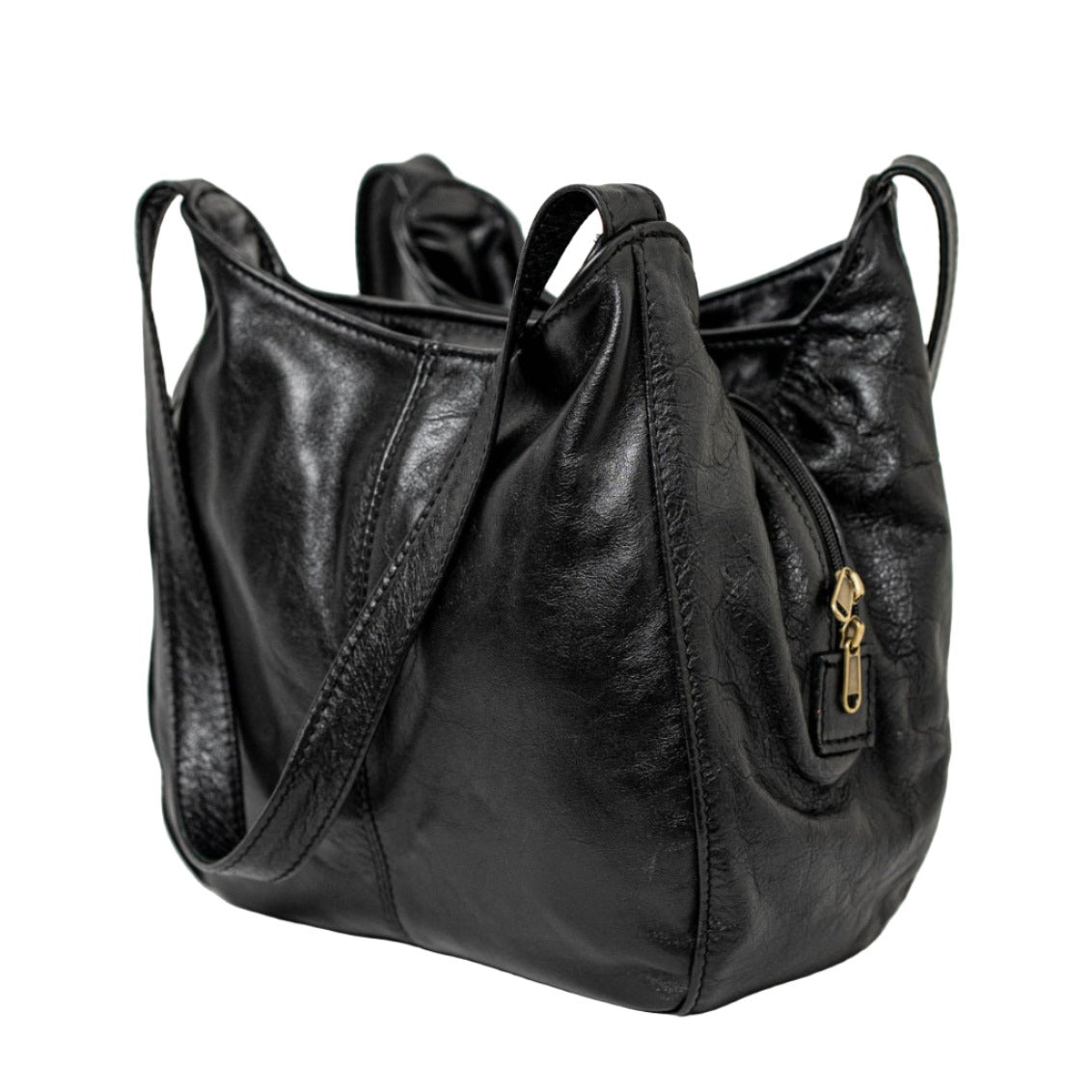 A smiling lady carrying beautiful black corra leather bag from Cape Masai Leather.