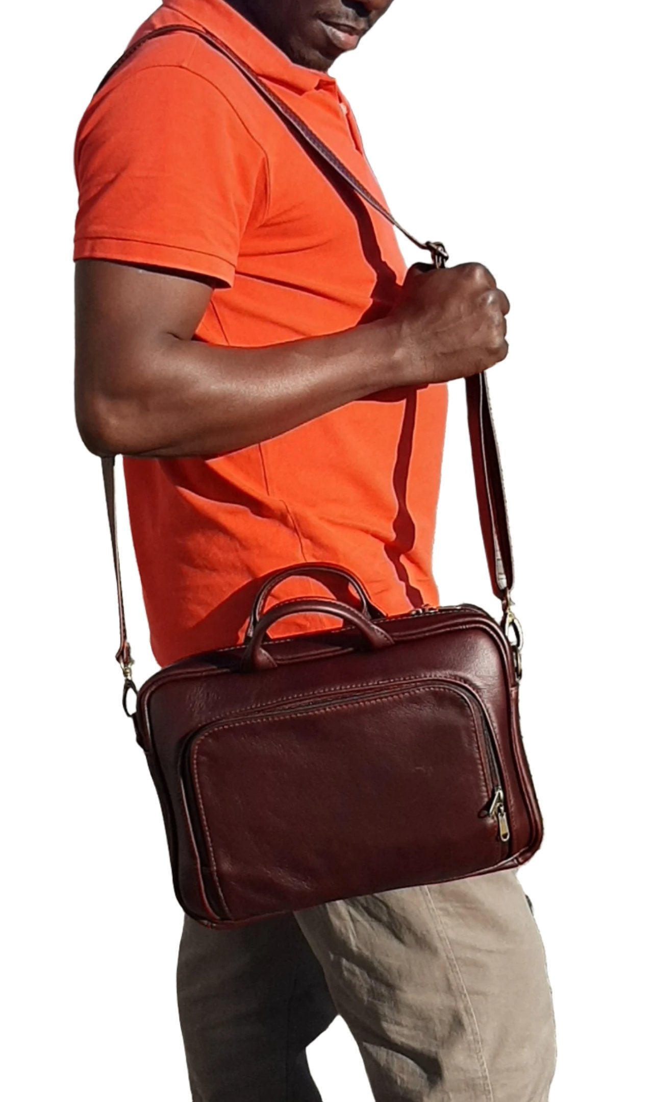 A man carrying beautiful genuine leather Iconic laptop briefcase 12 inches in dark tan by cape Masai leather