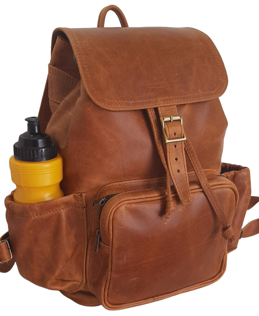 Leather Backpacks with flap XL in Diesel toffee tan colour by cape Masai leather