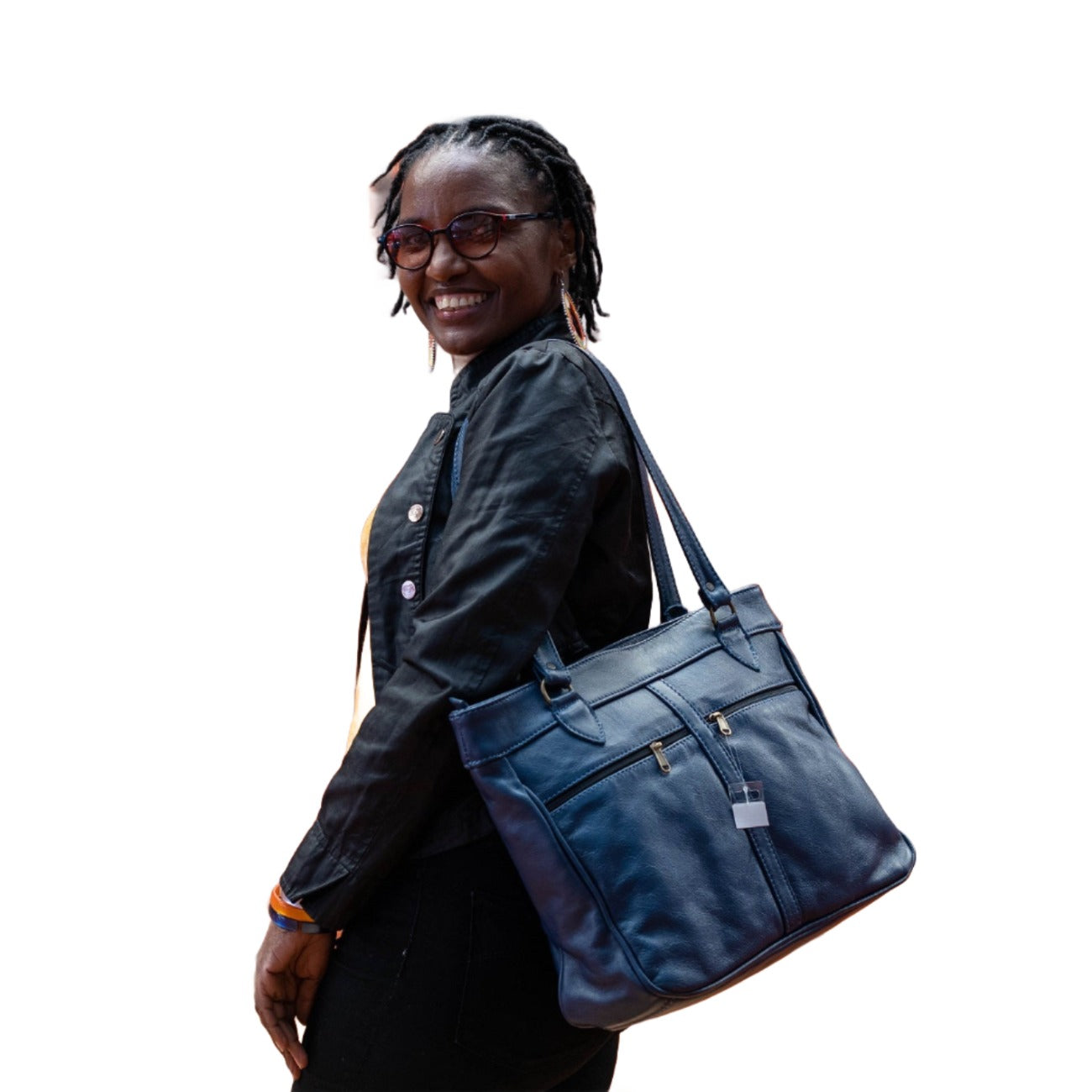 A happy beautiful lady walking with her tote bag small from cape Masai Leather