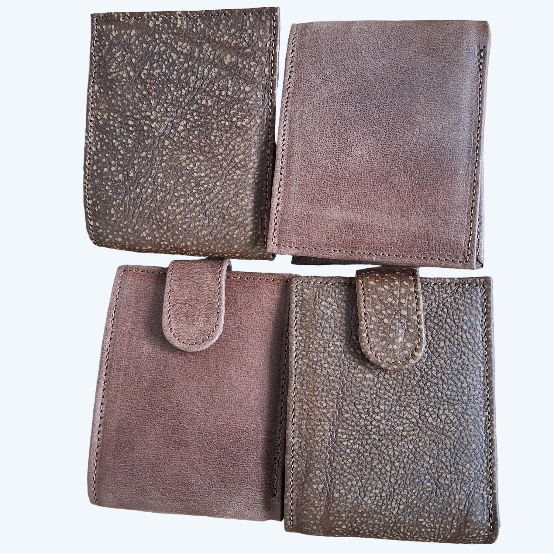 4 Small Men's wallets in different colours.