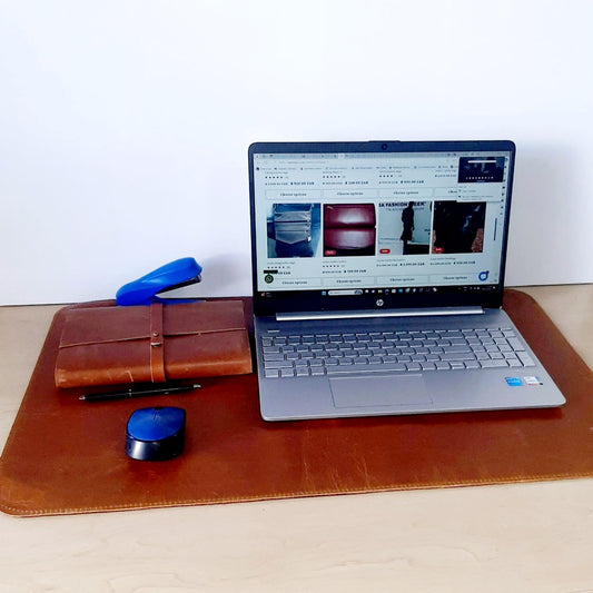 A Laptop and A5 notebook on Laptop Leather Mat in toffee tan