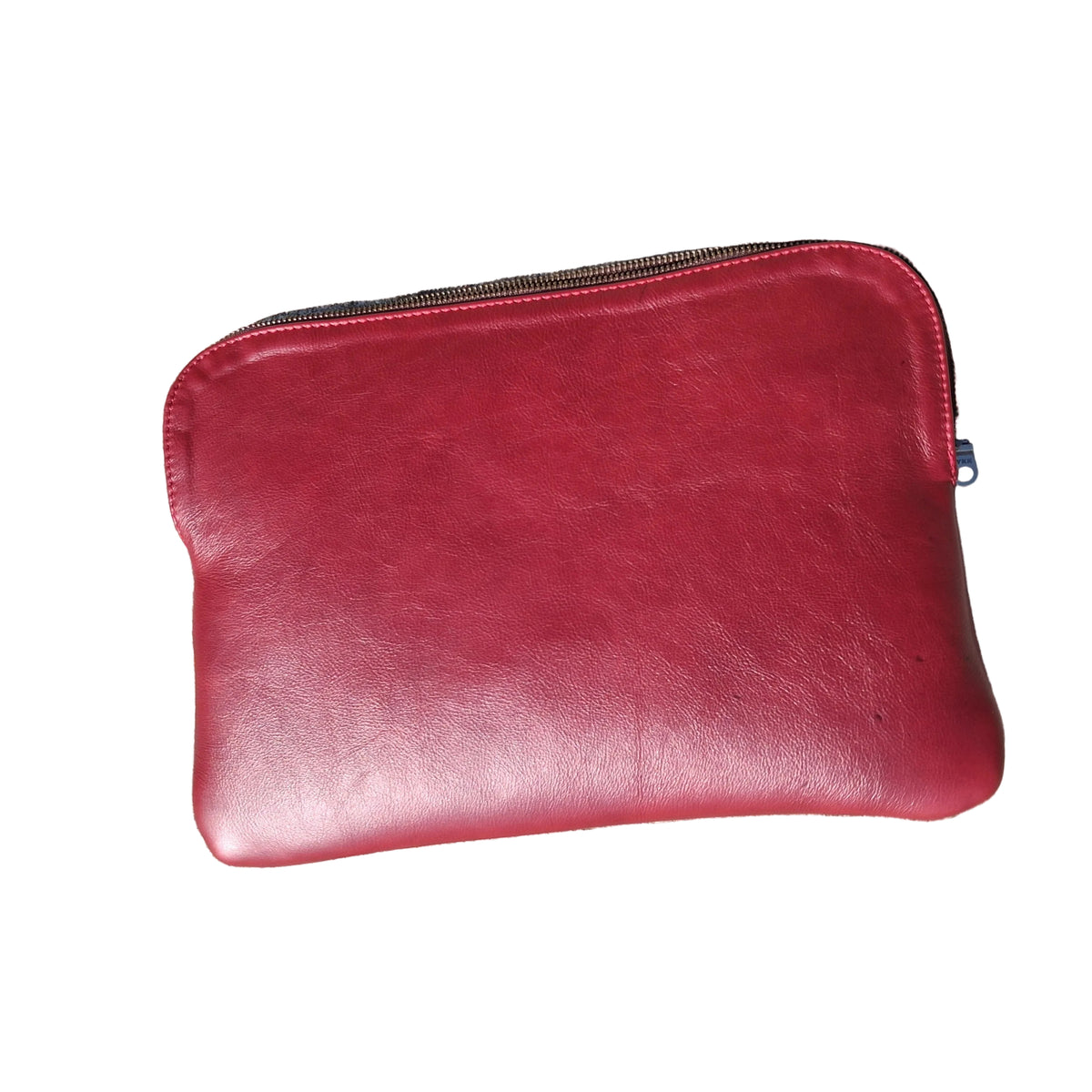 A red leather zippered pouch or sleeve photographed on a white background