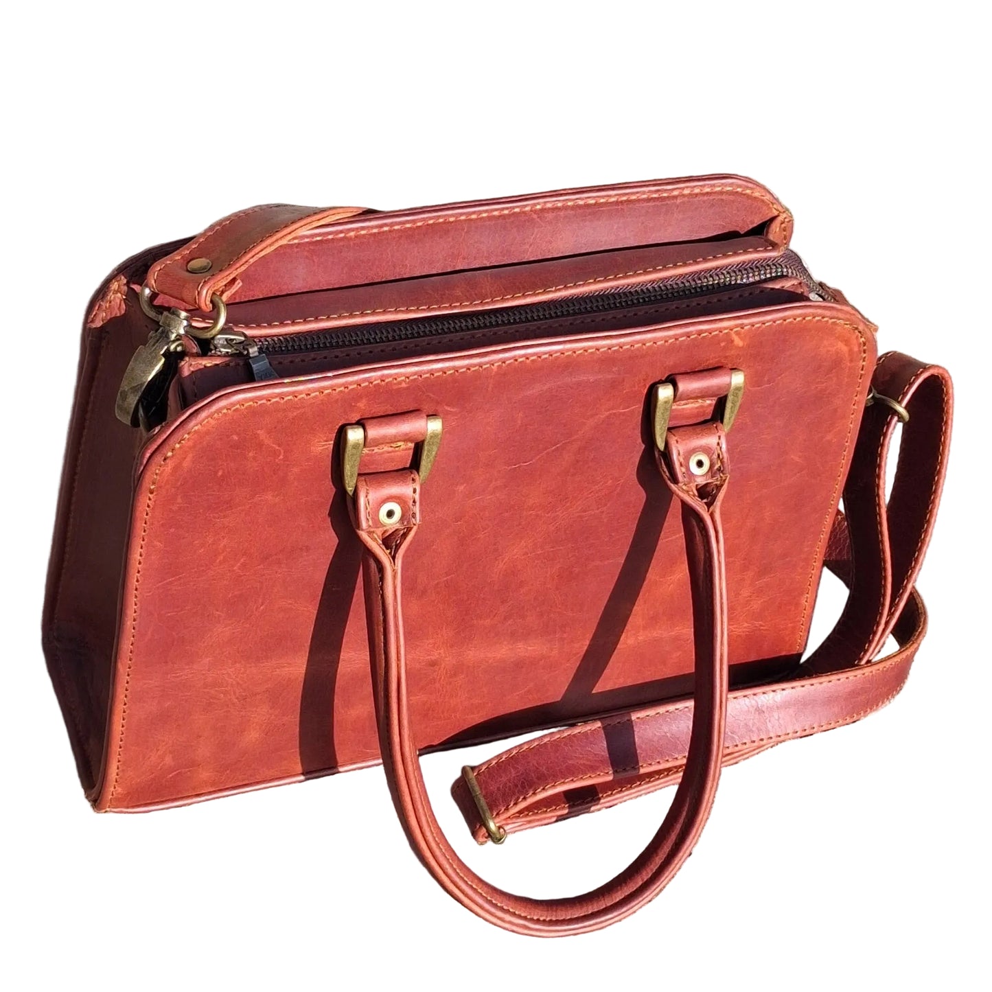 Cape designer bag small in pitstop cigar handbag with double top handles and a shoulder strap, 

