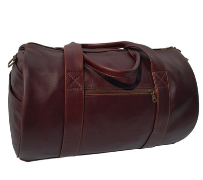 Duffle travel bag small dark tan from Cape Masai Leather standing on the ground