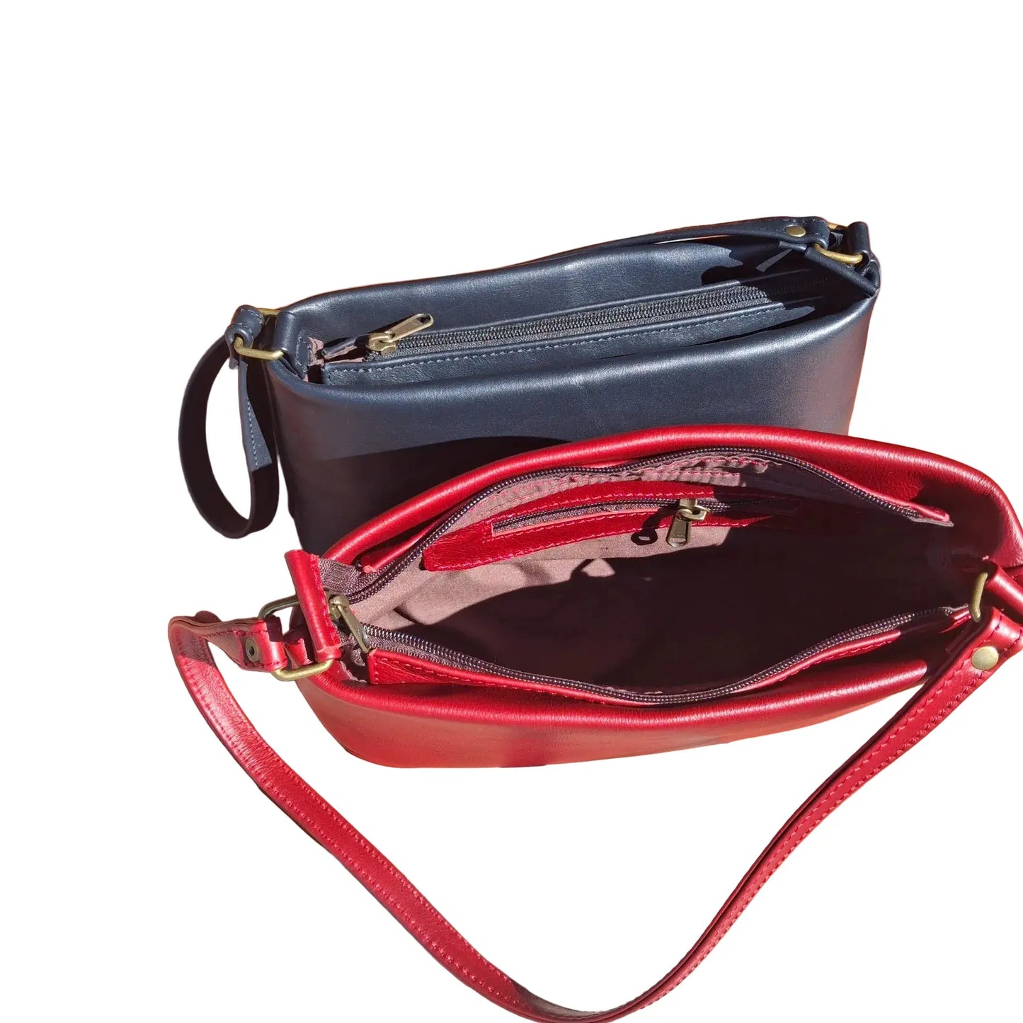 Two Lucy Women's Genuine Leather Mini Shoulder: one closed in dark navy and one open in cherry red, displaying the interior compartments and lining.