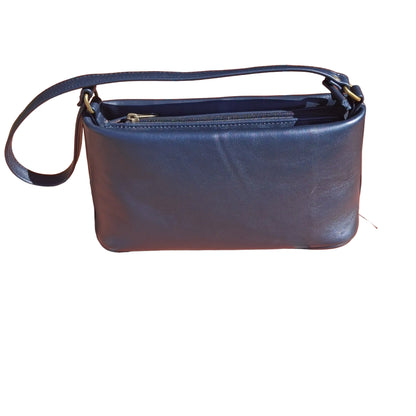 A dark navy blue Lucy Women's Genuine Leather Mini Shoulder w a top zipper and a single strap