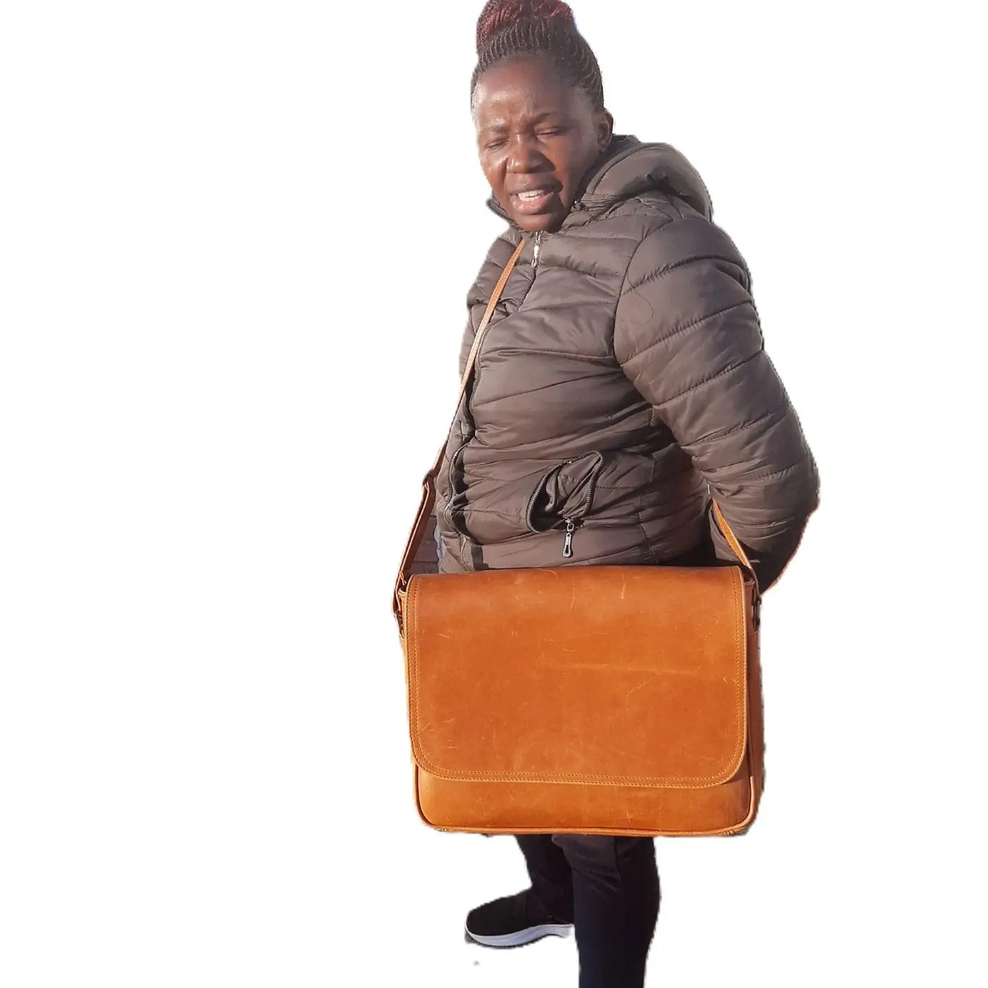  a lady carrying a Men's laptop bag 15" from Cape Masai leather