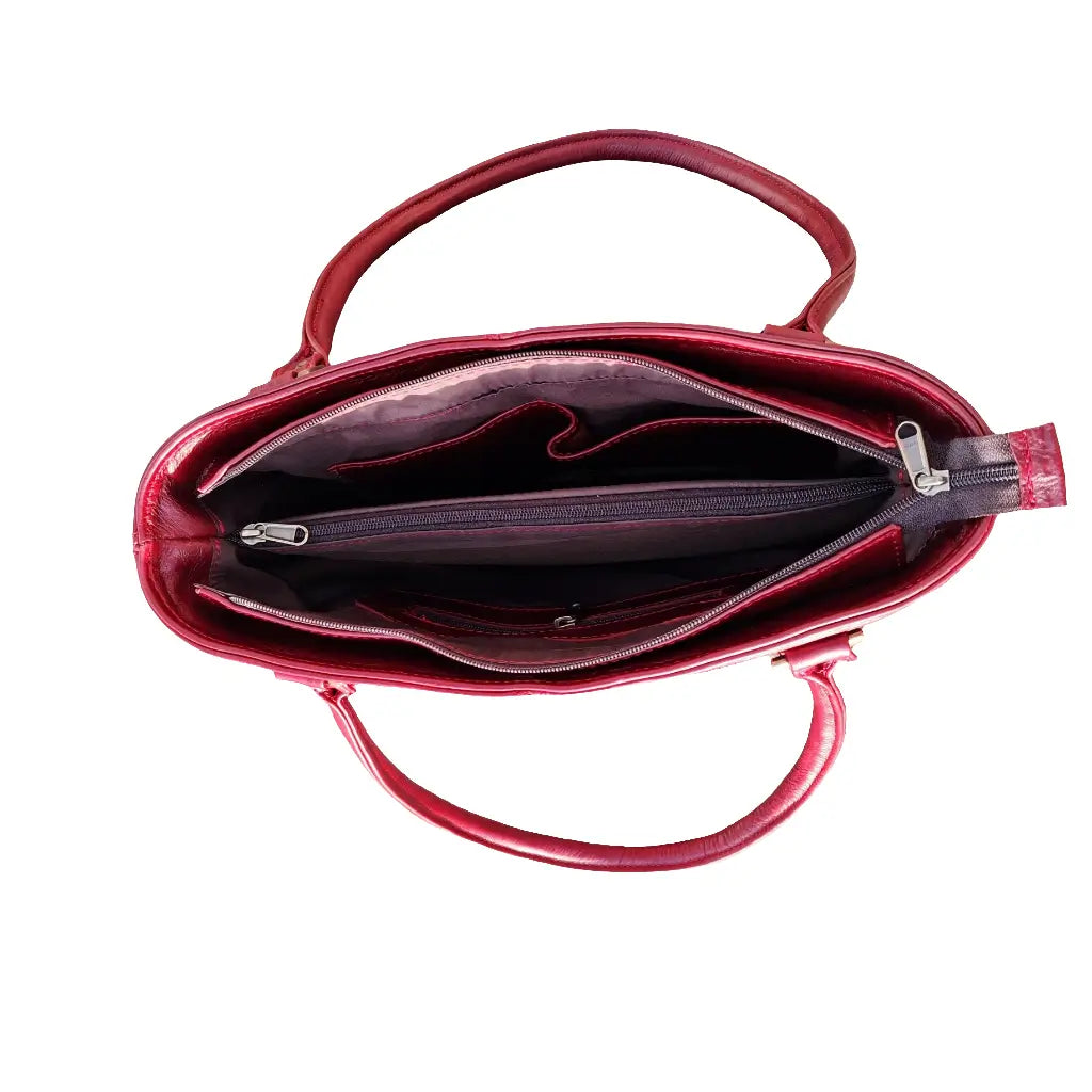 An open cherry red colour Michelle leather tote bag on a white background made by Cape Masai Leather.