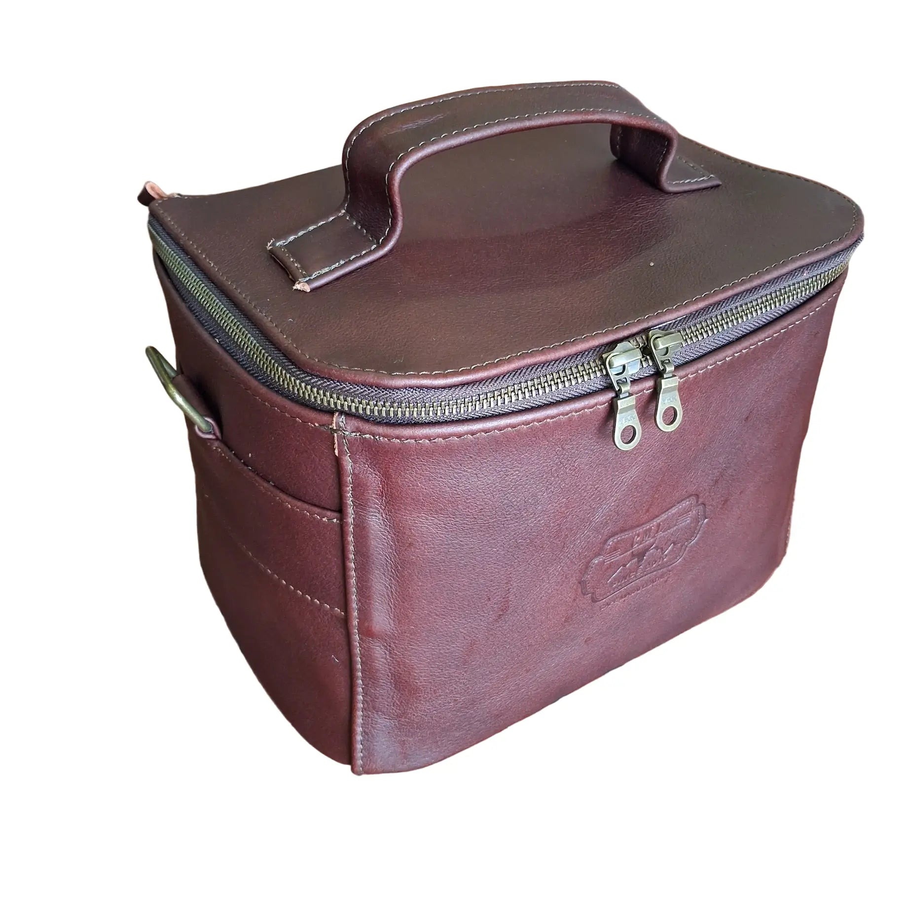 Vanity bag small with shoulder strap in dark red colour.