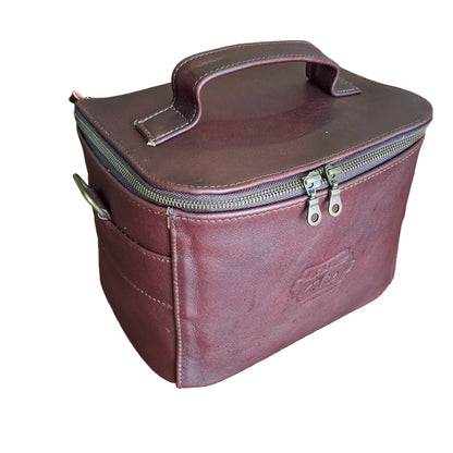 Vanity bag small with shoulder strap in dark red colour.