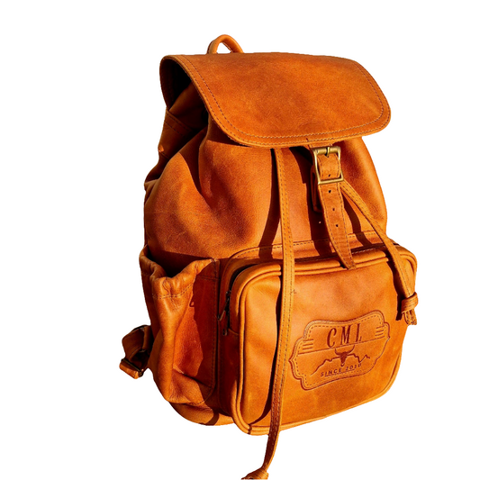 Leather Backpacks with flap XL in Diesel toffee tan colour by cape Masai leather 