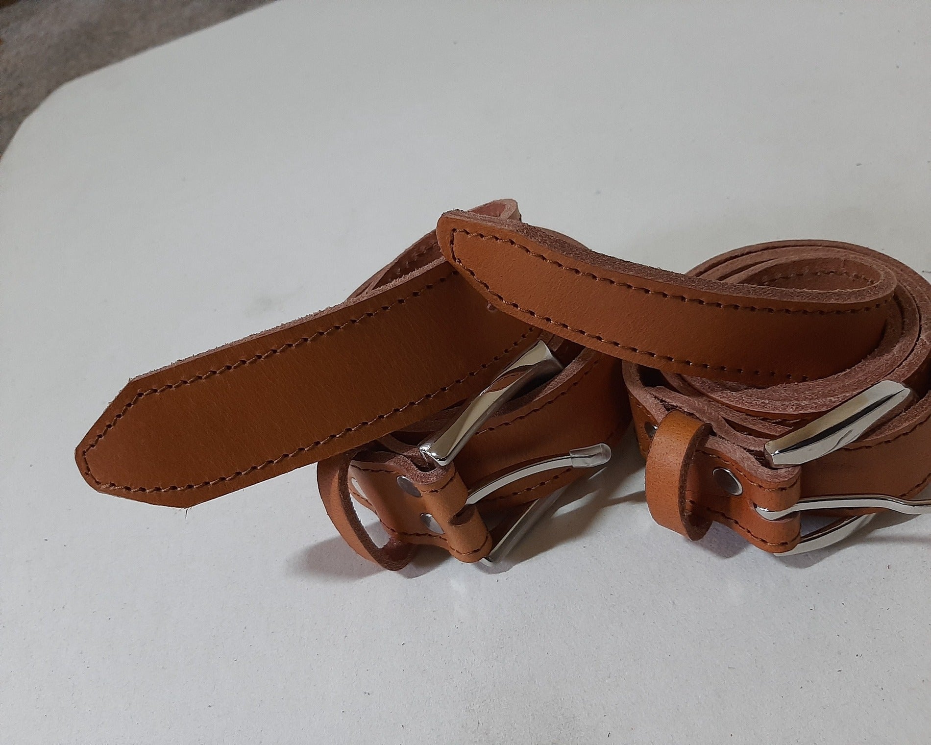 2 tan Jean's genuine leather belts from cape Masai Leather