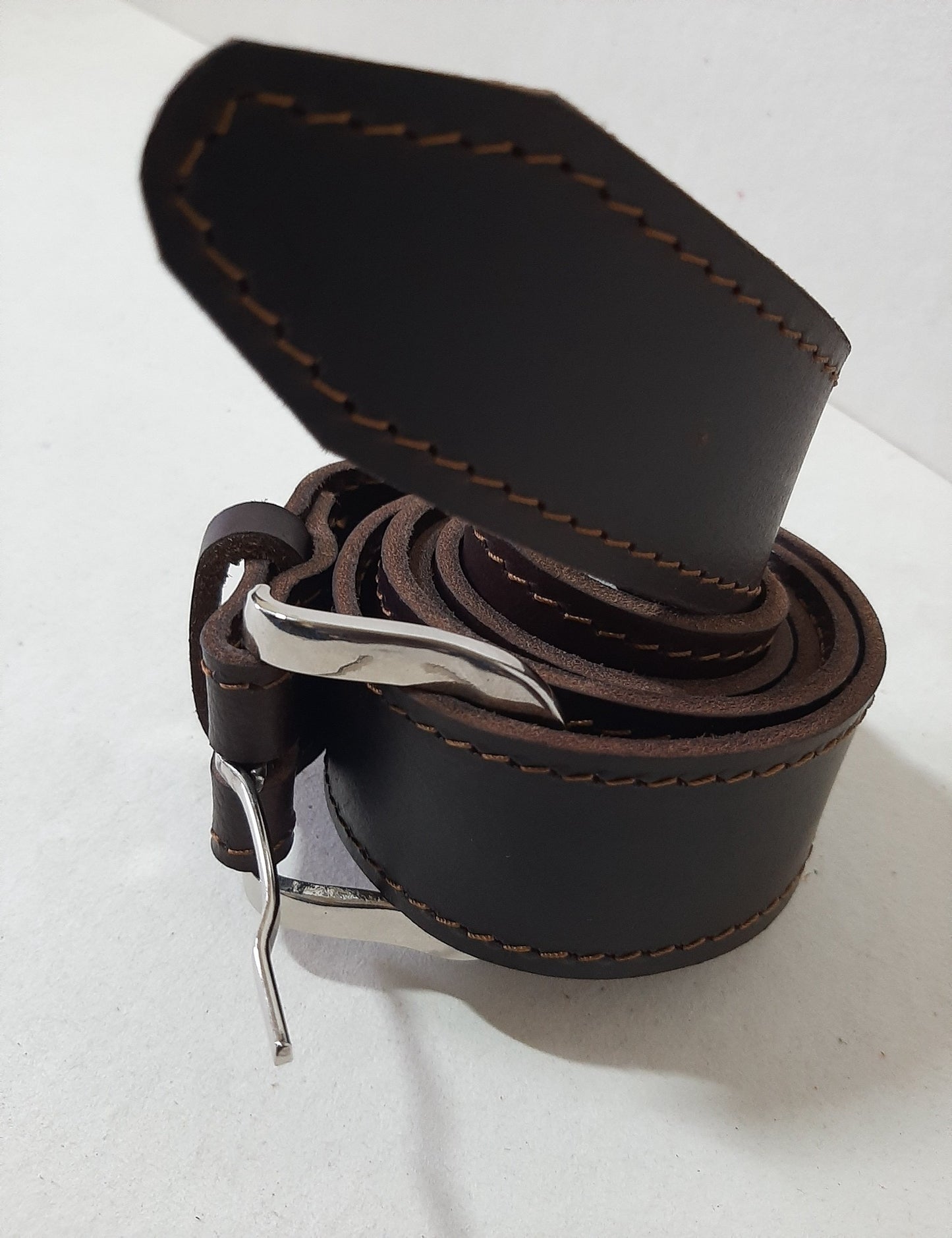 A dark brown Jean's genuine leather belts from cape Masai Leather