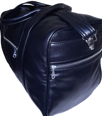 A beautiful light tan Anny Marie travel bag from Cape Masai Leather  Edit alt text