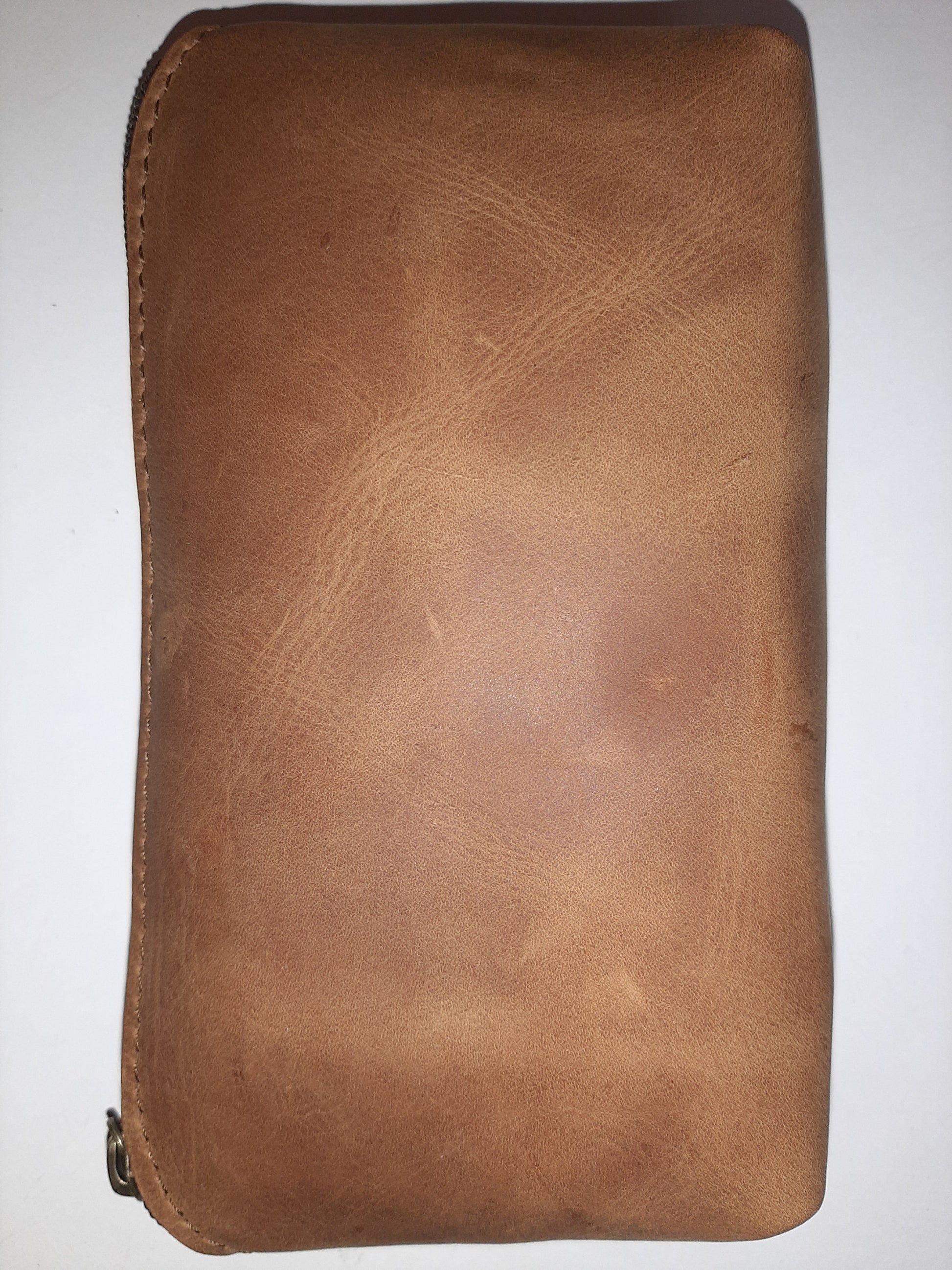 Beautiful genuine leather hand made makeup purse in brown tan cow hide 