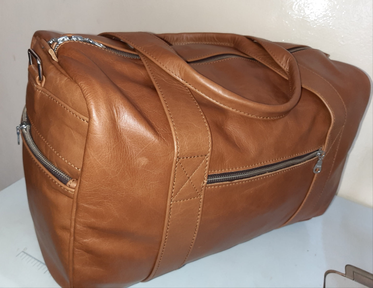 A beautiful light tan Anny Marie travel bag from Cape Masai Leather
