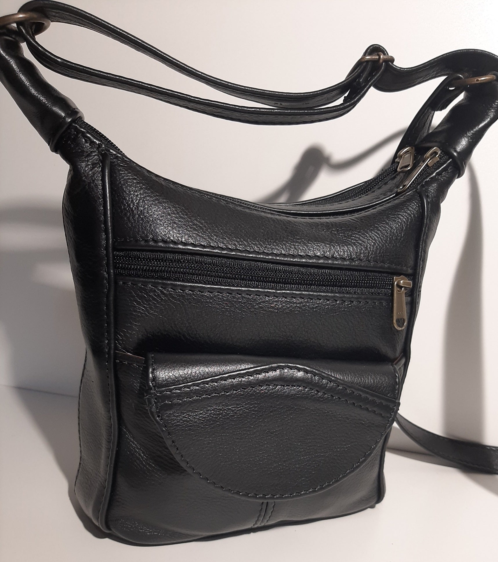 A SH small leather bags in black colour - cape Masai Leather