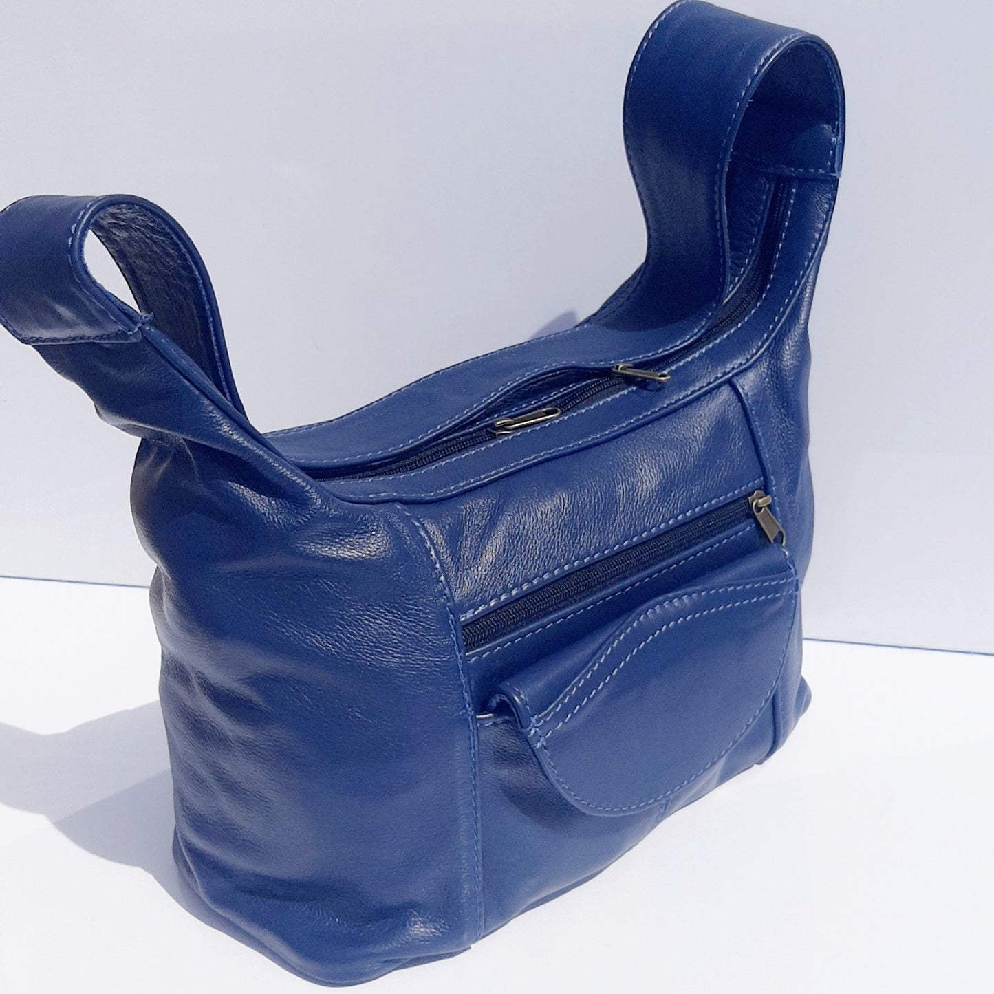 Gb7 leather bags with flap in Navy blue colour made by cape Masai Leather