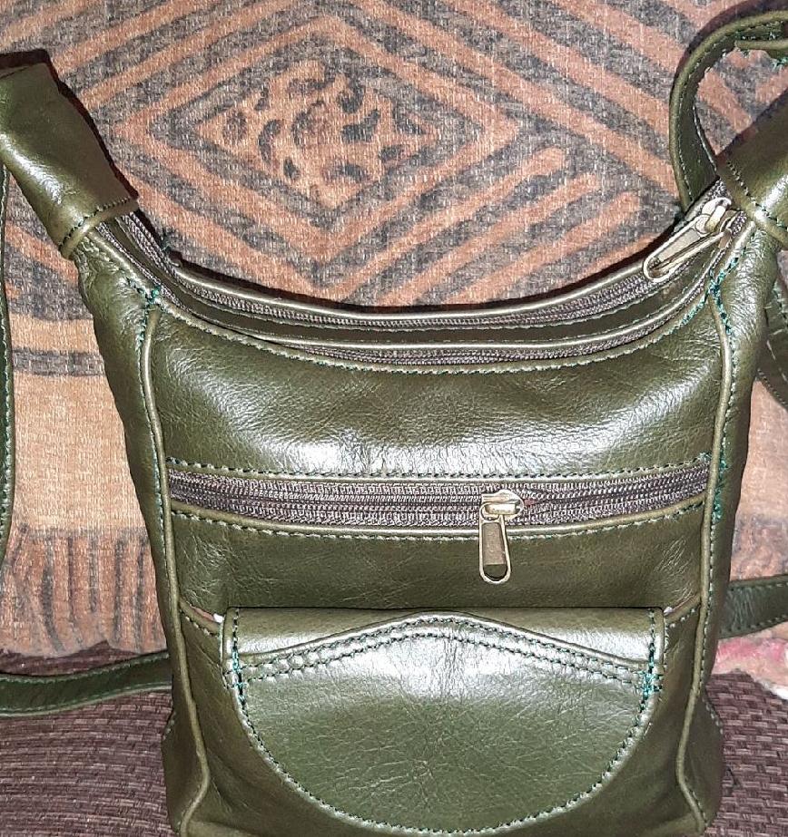 A SH small leather bags in olive green colour - cape Masai Leather