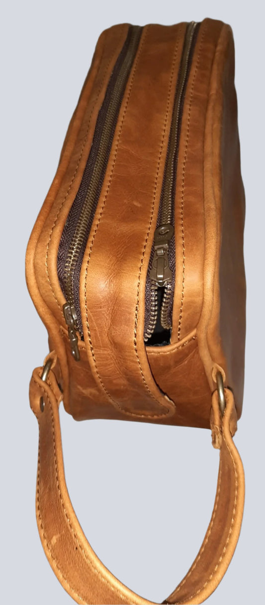  J boy toiletry bag in toffee tan by Cape Masai leather 