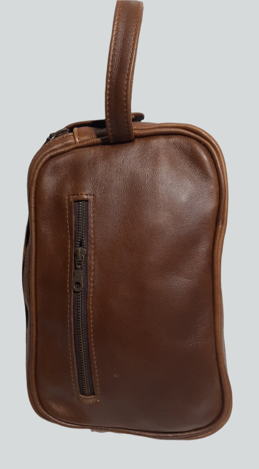 J boy toiletry bag in pecan tan - Cape Masai leather 