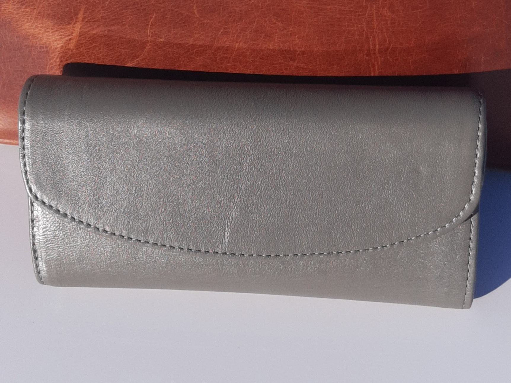 Genuine leather hand made ladies wallets/purse in gray colour.