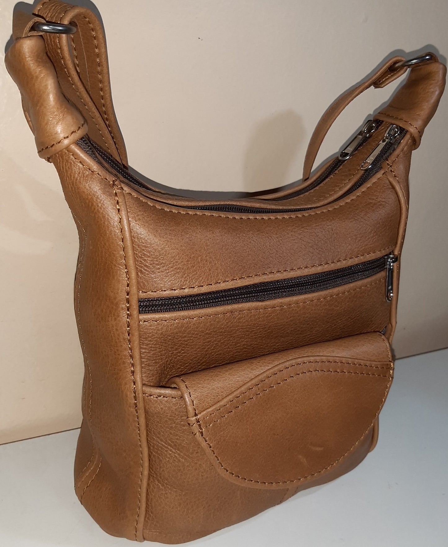 A SH small leather bags in ginger colour - cape Masai Leather