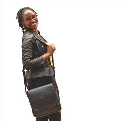 A  lady carrying a beautiful crossbody Sheryl leather bags from Cape Masai leather  in Cape Town 